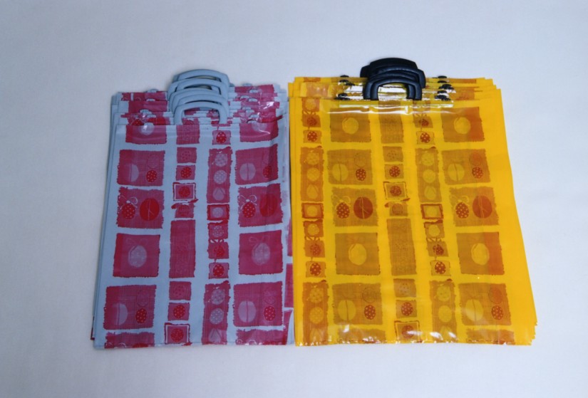 Rigid-handle bags